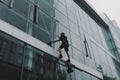 Windows cleaners at the mall. Neural network AI generated Royalty Free Stock Photo