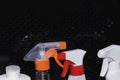 Windows cleaning sprays. bottles with sprays for cleaning on the black background Royalty Free Stock Photo