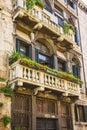 Windows and doors in an old house decorated with flower