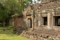 Windows and doorway in stone temple wall