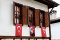 Windows with flags in Safanbolu