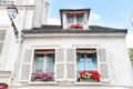 Windows with flowers on Montmartre street Royalty Free Stock Photo