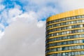 Windows and golden facade of Skyscraper Business Office against Royalty Free Stock Photo