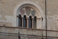 Windows at the Inner yard of medieval palace Palazzo del Broletto, Brescia, Lombardy, Italy
