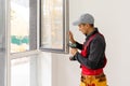 windows installation workers, worker window in a building Royalty Free Stock Photo