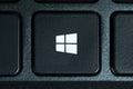 Windows logo on the black laptop keyboard buttons. top view