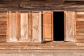 Windows made of old wood on wooden wall Royalty Free Stock Photo