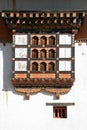Windows on the main facade of the Gangtey Gompa in Gangtey, Bhutan