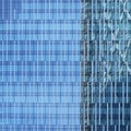 Windows on modern glass and steel skyscraper building - abstract business background Royalty Free Stock Photo