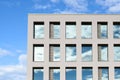 Windows in a modern office block reflect the sky Royalty Free Stock Photo
