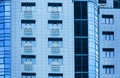 Windows of multi-storey building glass and steel office lighting Royalty Free Stock Photo