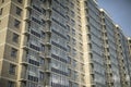 Windows in new building. Apartment building in city. New housing Royalty Free Stock Photo