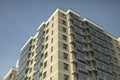 Windows in new building. Apartment building in city. New housing Royalty Free Stock Photo