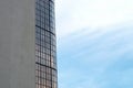 Windows of an office building against the sky