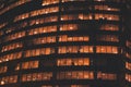 Windows of office building by night Royalty Free Stock Photo