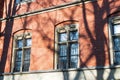 Windows in an old building made of red bricks Royalty Free Stock Photo