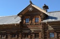 Windows of old farm house in open-air museum Malye Korely featuring the traditional wooden architecture of Arkhangelsk area