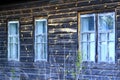 Windows of the old rural wooden house Royalty Free Stock Photo