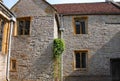 Windows and old stone walling in an English Manor House Royalty Free Stock Photo