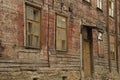 Windows of the old wooden house. wooden wall with windows and door background