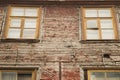 Windows of the old wooden house. wooden wall with windows