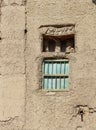 Windows in the part-ruined village of Al Hamra in Oman