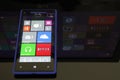 Windows Phone 8 with Windows 8 reflection Royalty Free Stock Photo