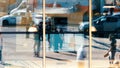 Windows reflection in city people walking on the street cars urban City lifestyle building,,background colorful summer day in Tal