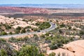 The Windows road winding through desert in Arches National Park, view from Garden of Eden viewpoint