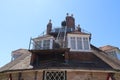 The windows in the roof of an unusual historic sixteen sided house on a beautiful sunny summers day in Devon, England Royalty Free Stock Photo