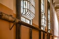 Windows with security bars of a corridor of a module and a block of the federal prison of Alcatraz Island . Royalty Free Stock Photo