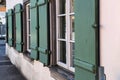 Windows with shutters on the front of the house Royalty Free Stock Photo