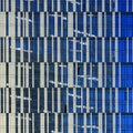 Windows of skyscraper, architecture close up. Glass and concrete. Urban landscape. City Business District. Modern Royalty Free Stock Photo