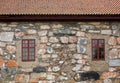 Windows in stone wall Royalty Free Stock Photo