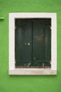 Windows of Venice, Murano and Burano. Picturesque windows with shutters on the famous island Burano. Decorated window on colorful Royalty Free Stock Photo