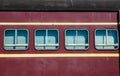 Windows of the Vintage train in Maroon color. Royalty Free Stock Photo