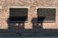 Windows on the wall of house block in concentration camp Auschwitz, Poland