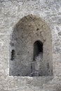 Windows in the walls of the ancient stone Akkerman fortress in Ukraine Royalty Free Stock Photo