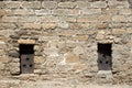 Windows in the walls of the ancient stone Akkerman fortress in Ukraine Royalty Free Stock Photo