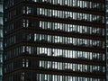 Windows of white lit offices in tall Office building Royalty Free Stock Photo