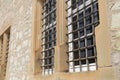 Windows with metal grilles