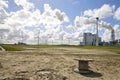 Wind powered generators and large Fossil-fuel Power Plant