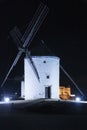 stands on hilltop enjoying the peaceful twilight moment, Consuegra, Spain Royalty Free Stock Photo