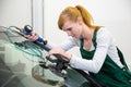 Windscreen repair by glazier in garage after stone-chipping damage Royalty Free Stock Photo