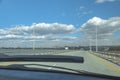 Windscreen view of road, sky