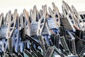 Windshield ice scrappers and snow brushes in a pile on a rack for preparation for a big storm Royalty Free Stock Photo