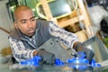 Windshield replacement man changing windscrenn on car