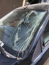 Windshield vandalized and covered with pollen