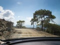 Windshield view of small road at Akamas, Cyprus.
