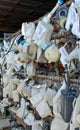 Windshield Washer Fluid Tanks At a Junkyard